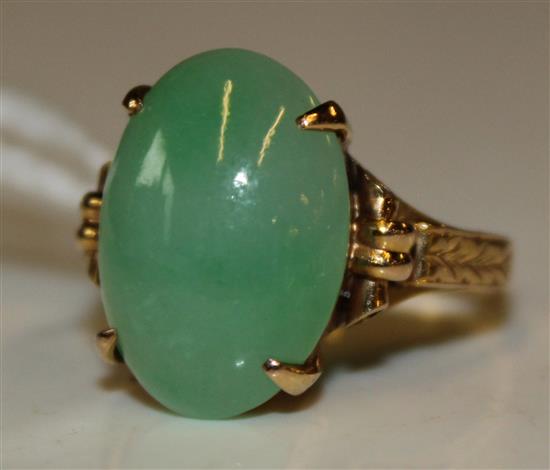 14K gold and oval cabochon jade dress ring, scrolled setting